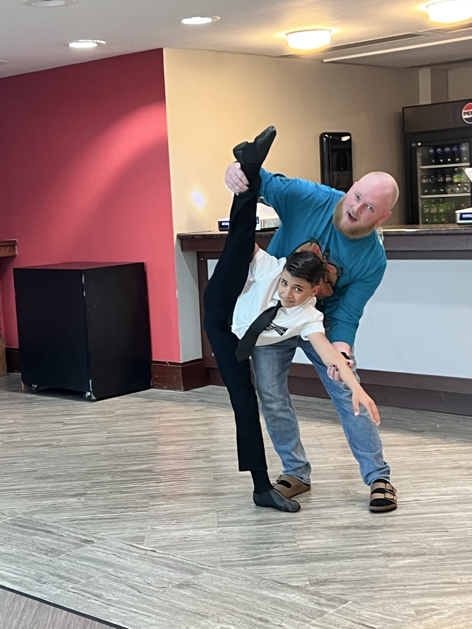 Dixon Bowles working with a student