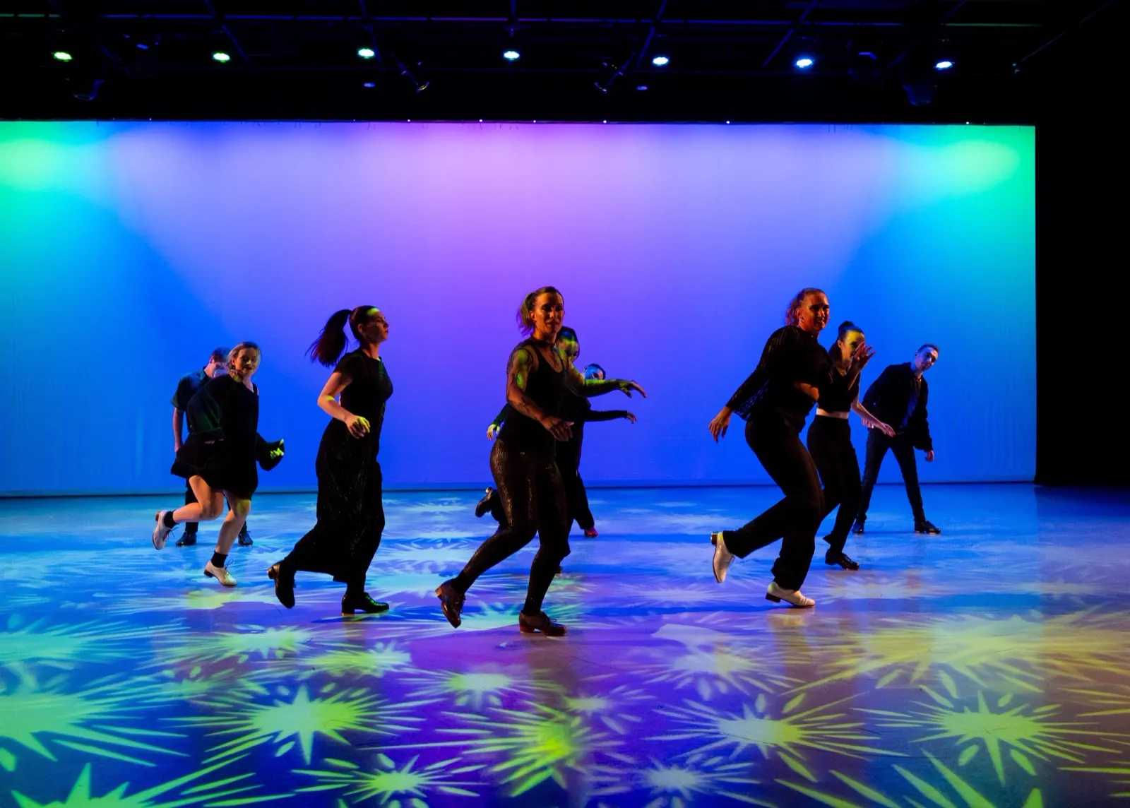 dwdCOLLECTIVE on stage at A&middot;Muse in Space &middot; the company spread across the floor